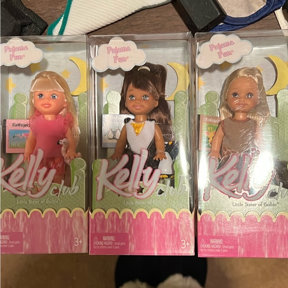 Three Kelly Club Dolls wearing Pink, White and Brown Outfits NRFB. NWT